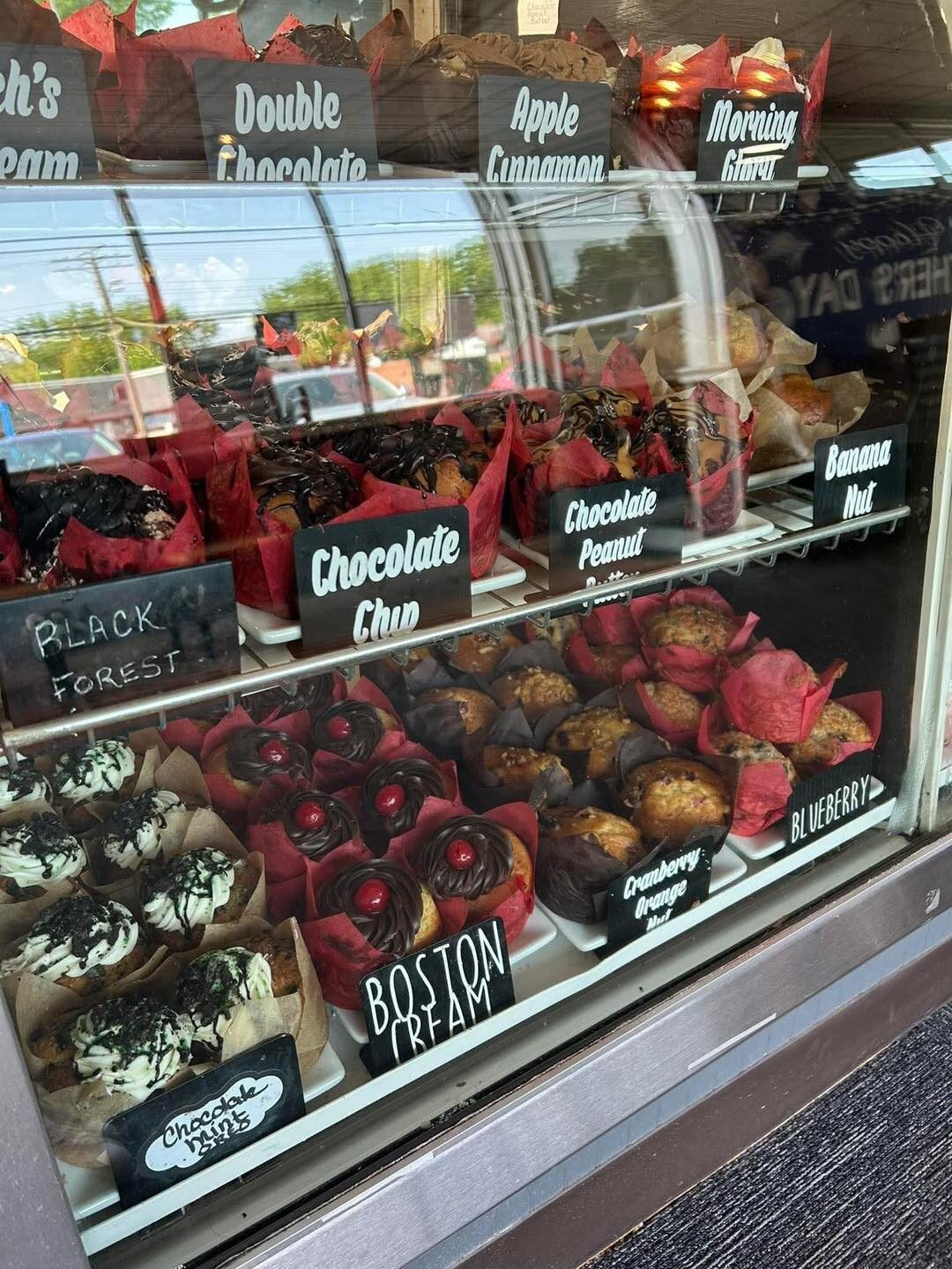 The Becker’s bakery case full of muffins
